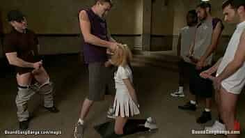 Blonde cheerleader Emma Haize is blindfolded and bound on knees and throat fucked then suspended double penetration interracial fucked by big dicks video